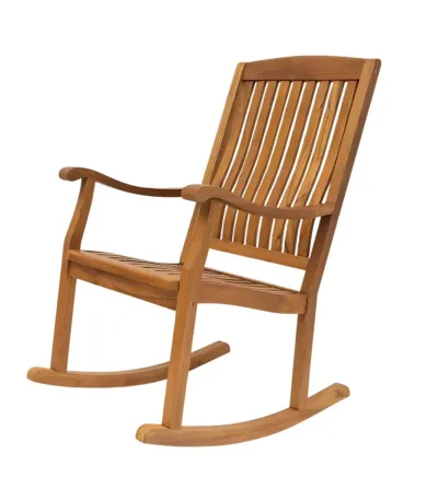 Rock chair crafted from authentic GI-tagged Nilambur teak with spindle back and curved rockers